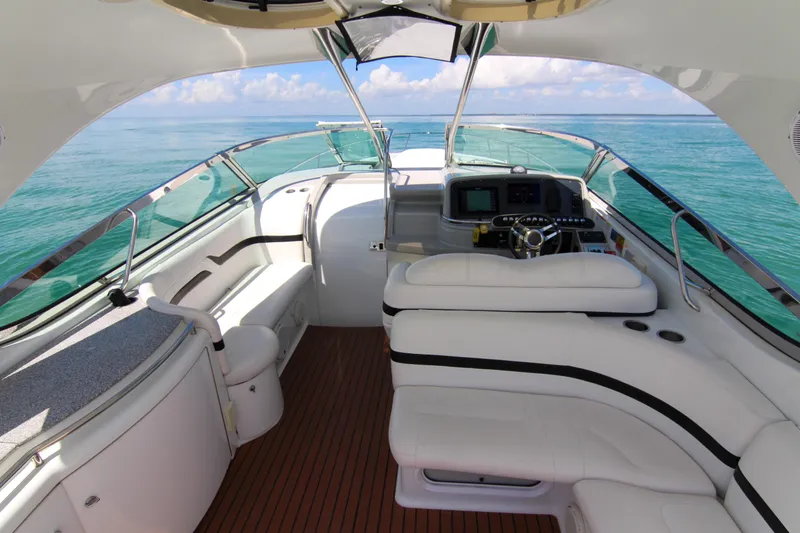 Slide: The Image of 2008 Formula 400 Super Sport yacht interior with luxurious seating and ocean view. - 10