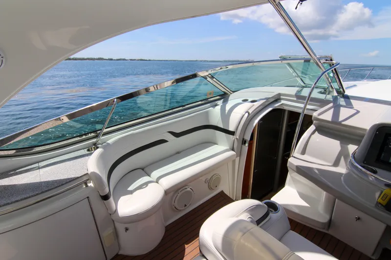 Slide: The Image of 2008 Formula 400 Super Sport yacht interior with ocean view and luxurious seating. - 12