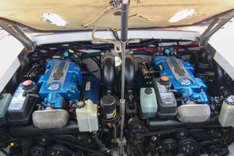 Slide: The Image of Twin engines of a 2008 Formula 400 Super Sport boat, showcasing powerful performance. - 14