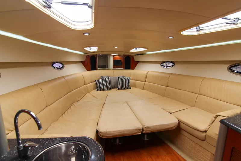 Slide: The Image of Luxurious interior of 2008 Formula 400 Super Sport yacht with beige seating and modern amenities. - 18