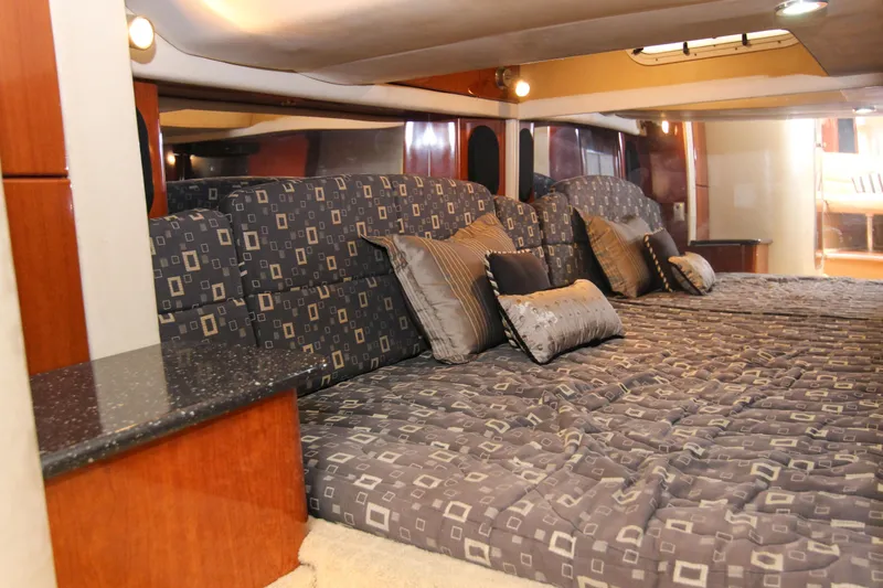 Slide: The Image of Luxurious interior of 2008 Formula 400 Super Sport yacht with plush bedding and elegant decor. - 19