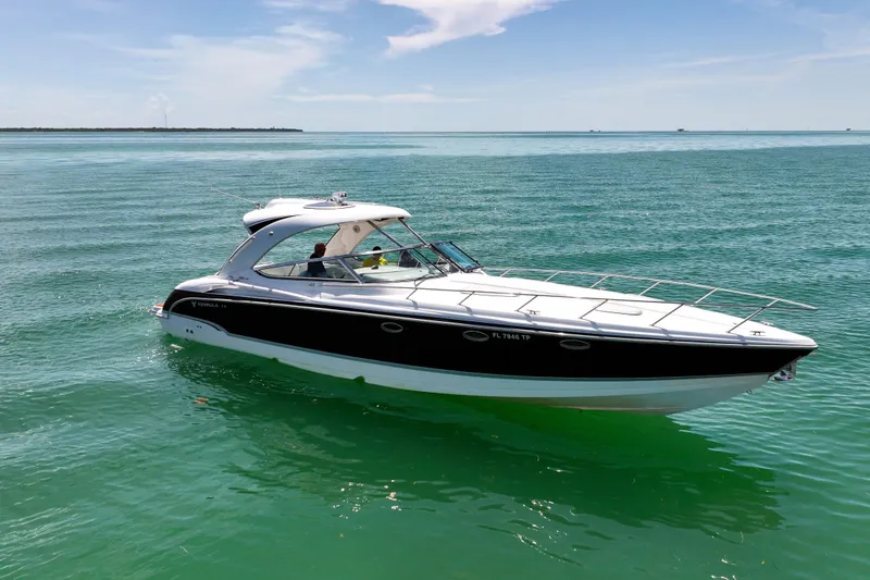 Slide: The Image of 2008 Formula 400 Super Sport boat cruising on clear blue water. - 2