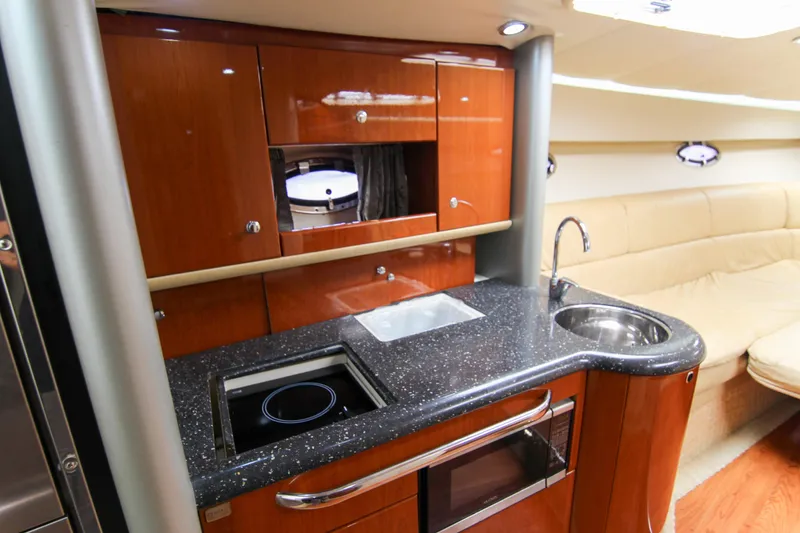 Slide: The Image of Luxurious interior of 2008 Formula 400 Super Sport yacht with modern kitchen amenities. - 22