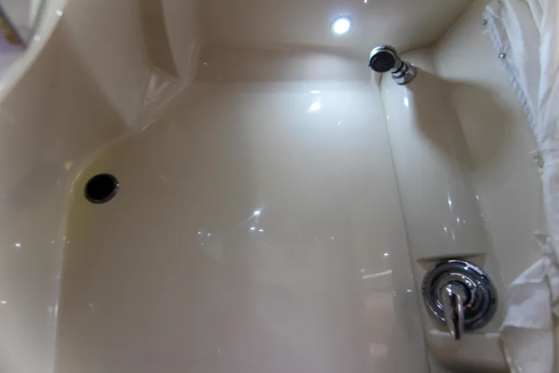 Slide: The Image of 2008 Formula 400 Super Sport boat interior with shower and lighting. - 29