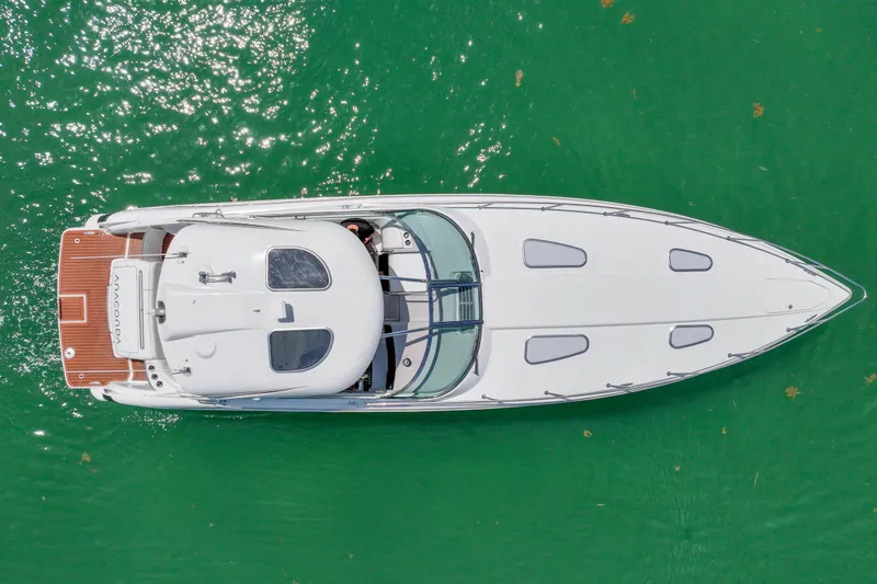 Slide: The Image of Aerial view of 2008 Formula 400 Super Sport boat on green water. - 4