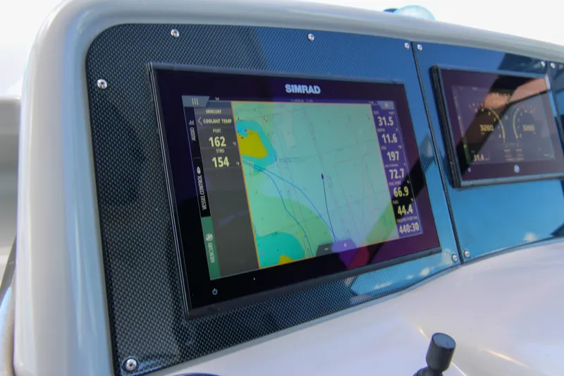 Slide: The Image of Dashboard of 2008 Formula 400 Super Sport with Simrad navigation display. - 9