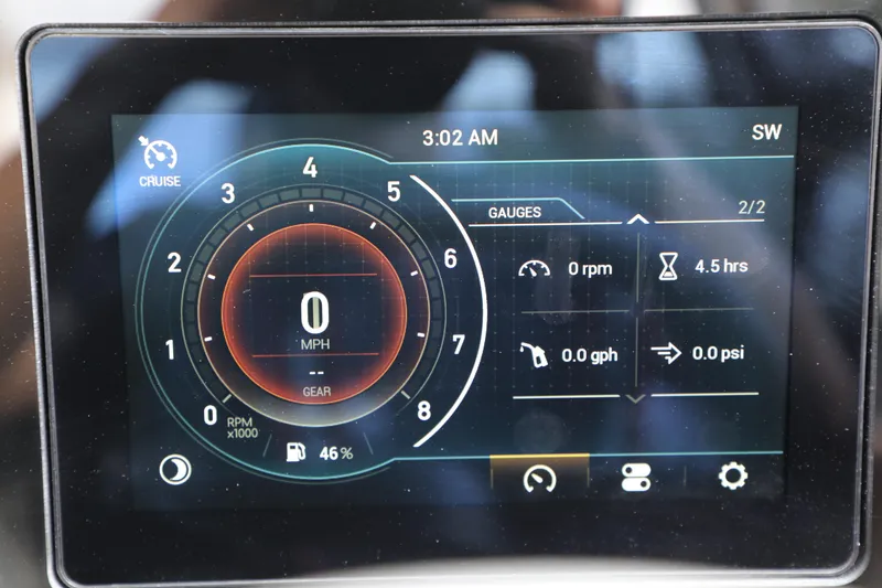 Slide: The Image of 2024 Scarab 235 Wake ID dashboard display showing speed, RPM, and fuel gauge. - 11