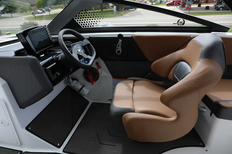 Slide: The Image of 2024 Scarab 235 Wake ID interior with modern dashboard and ergonomic seating. - 8