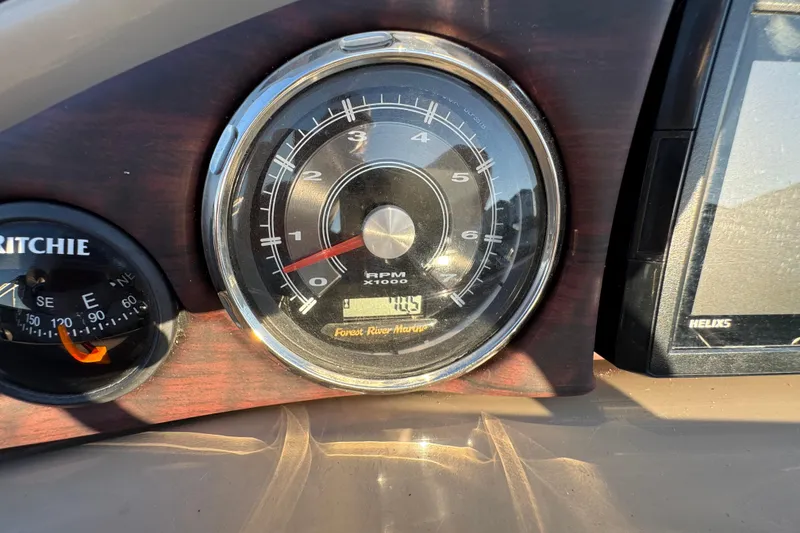 Slide: The Image of Dashboard of 2016 Xcursion 23RFE with RPM gauge and compass. - 14