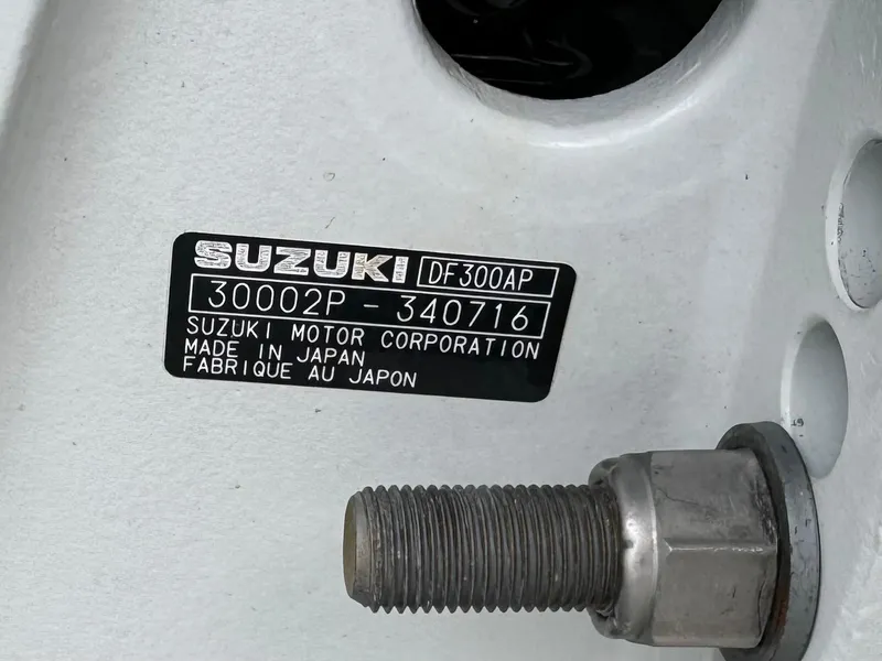 Slide: The Image of Label on Suzuki DF300AP engine, serial number 30002P-340716, made in Japan. - 12