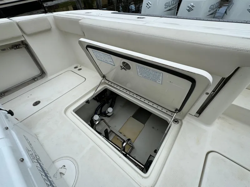 Slide: The Image of 2010 Hydra-Sports 3500 VX boat storage compartment open, showcasing interior details. - 31