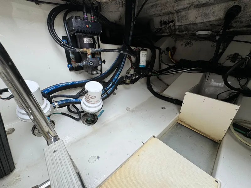 Slide: The Image of 2010 Hydra-Sports 3500 VX boat interior showing wiring and components. - 36