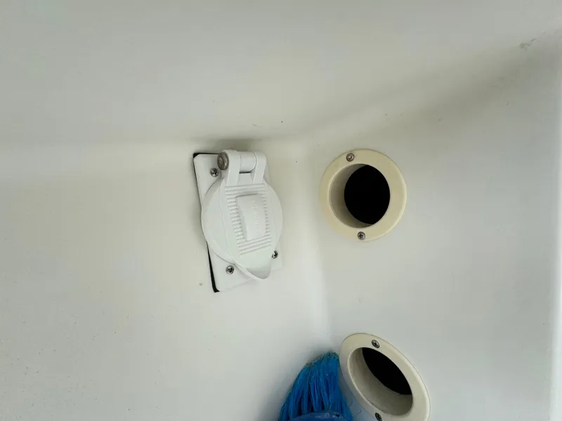 Slide: The Image of 2010 Hydra-Sports 3500 VX boat interior with white fittings and blue brush. - 39