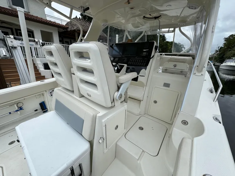 Slide: The Image of 2010 Hydra-Sports 3500 VX boat interior with helm and seating area. - 43