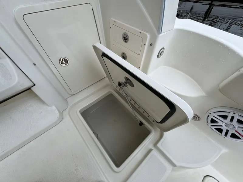 Slide: The Image of 2010 Hydra-Sports 3500 VX boat storage compartment open, showcasing interior space. - 48