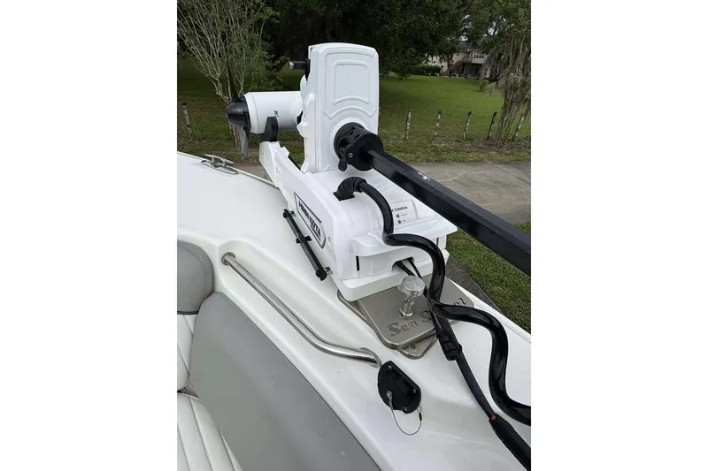 Slide: The Image of 2017 Sea Fox 266 Commander boat with mounted trolling motor on deck. - 15