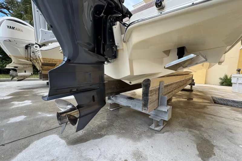 Slide: The Image of 2020 Scout 235 XSF boat on dry dock with Yamaha outboard motor. - 29