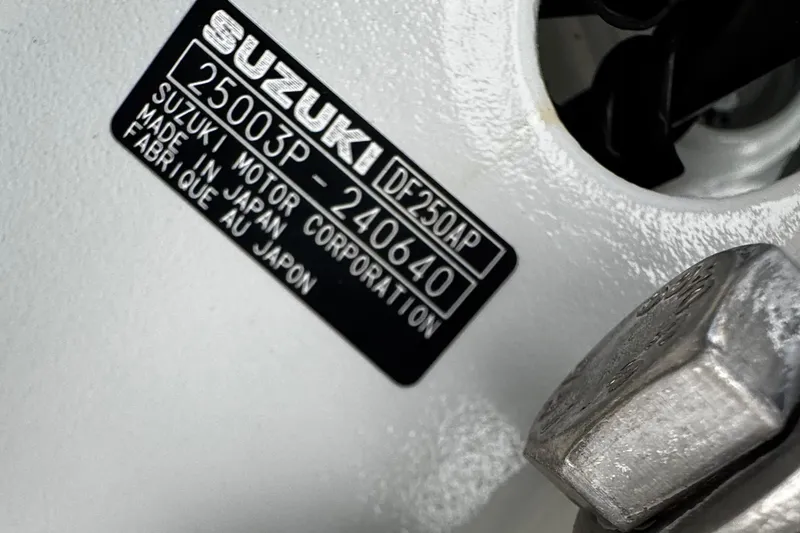 Slide: The Image of Close-up of Suzuki DF250AP engine label on 2022 Whitewater 28 Open boat. - 10