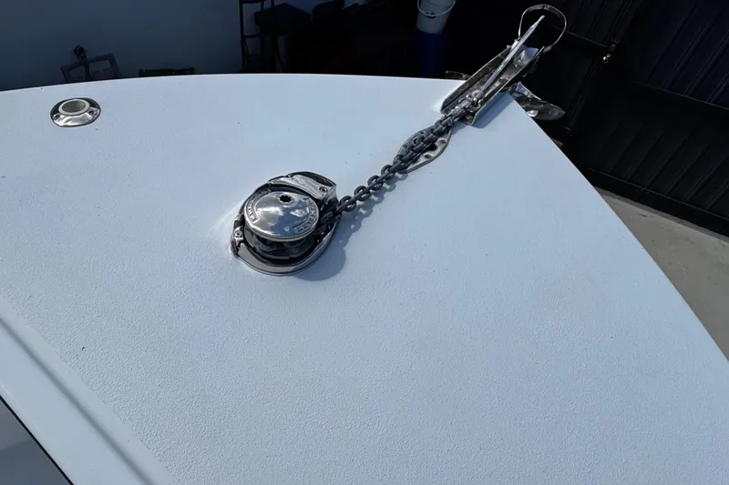 Slide: The Image of 2022 Whitewater 28 Open boat deck with anchor chain and winch. - 26