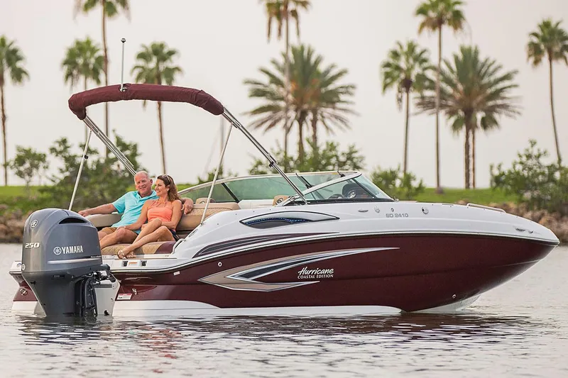 Slide: The Image of Manufacturer Provided Image: 2020 Hurricane SunDeck 191 OB boat cruising on water with a couple onboard. - 8