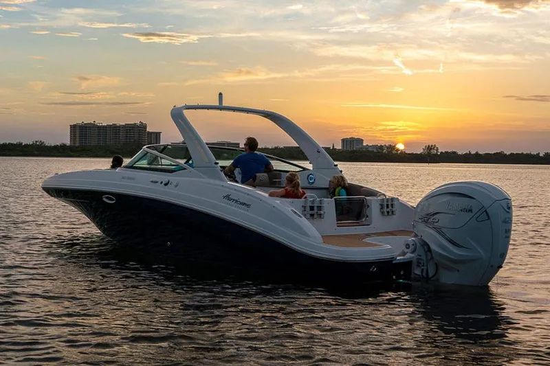 Slide: The Image of Manufacturer Provided Image: 2020 Hurricane SunDeck 191 OB boat cruising at sunset. - 9