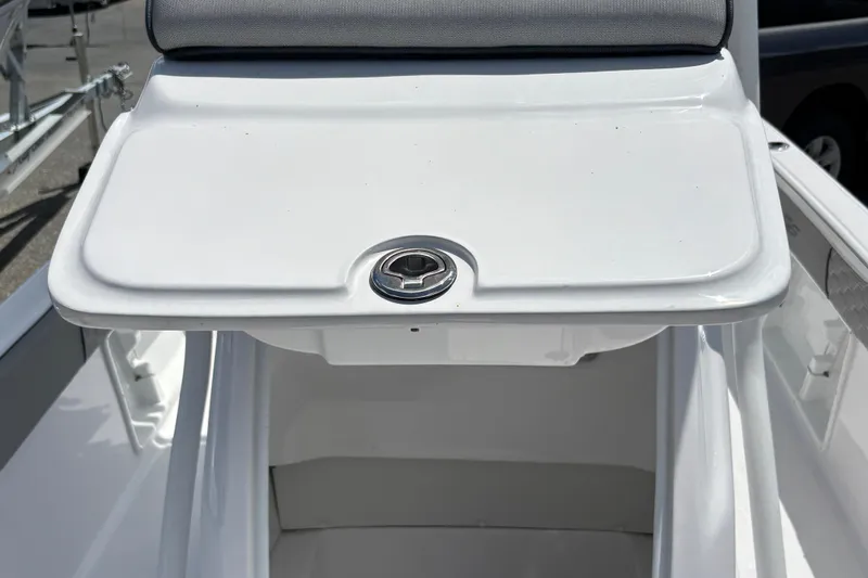 Slide: The Image of 2026 Glasstream 240 CCX boat storage compartment with a sleek white finish. - 12