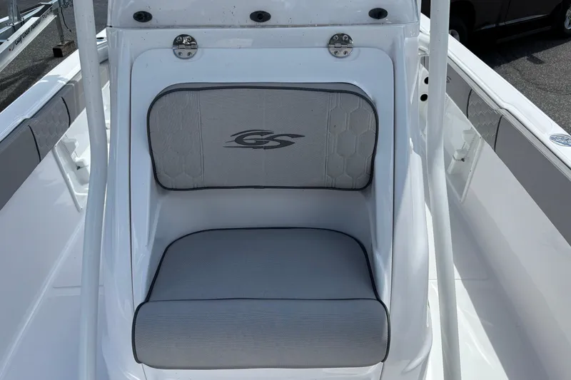 Slide: The Image of 2026 Glasstream 240 CCX boat seat with logo, featuring sleek white and gray design. - 19