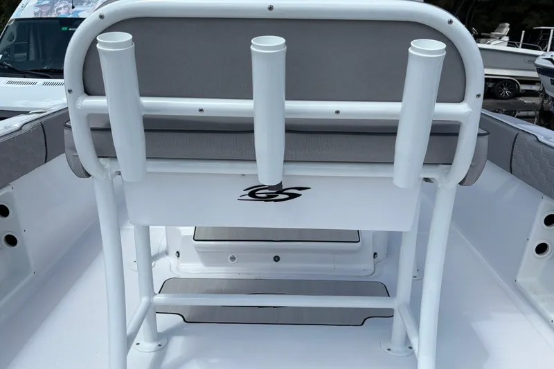 Slide: The Image of 2026 Glasstream 240 CCX boat interior with rod holders and seating. - 26
