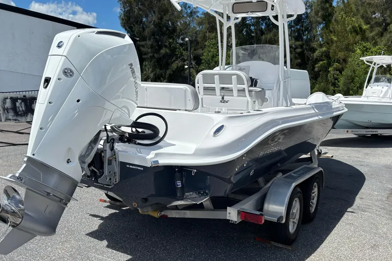 Slide: The Image of 2026 Glasstream 240 CCX boat on trailer, featuring a powerful Mercury outboard motor. - 6