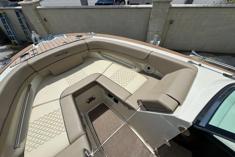 Slide: The Image of 2023 Chris-Craft Launch 25 GT boat interior with luxurious seating and elegant design. - 7