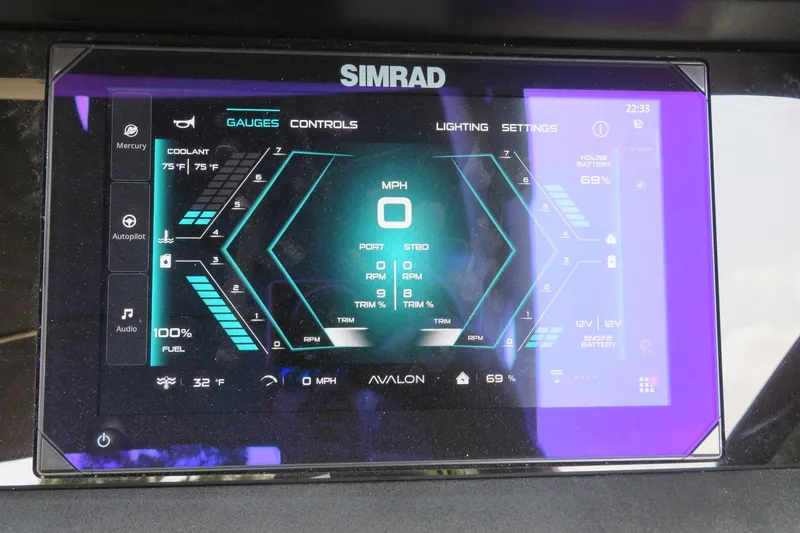 Slide: The Image of Simrad display on 2026 Avalon 2785 Excalibur LTD, showing gauges and controls. - 27