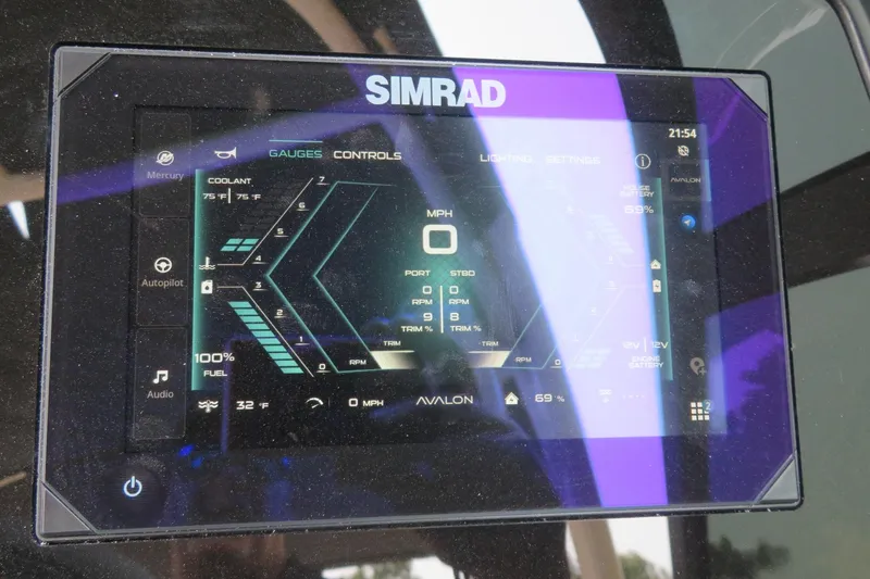 Slide: The Image of Simrad display on 2026 Avalon 2785 Excalibur LTD Quad Lounger, showing gauges and controls. - 28
