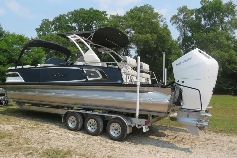 Slide: The Image of 2026 Avalon 2785 Excalibur LTD Quad Lounger Tri-toon boat with Mercury engine in Sarasota, FL. - 3