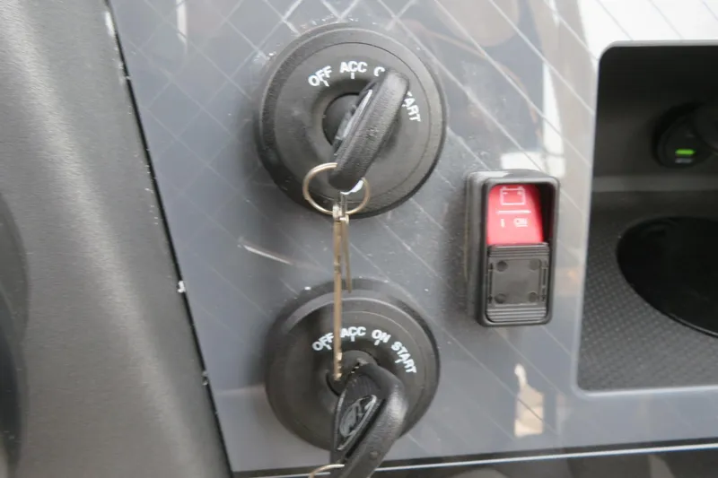 Slide: The Image of Dashboard of 2026 Avalon 2785 Excalibur LTD with ignition keys and switch. - 30