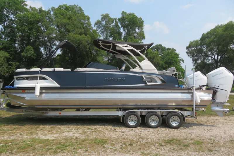 Slide: The Image of 2026 Avalon 2785 Excalibur LTD Quad Lounger Tri-toon boat on trailer in Sarasota, FL. - 37