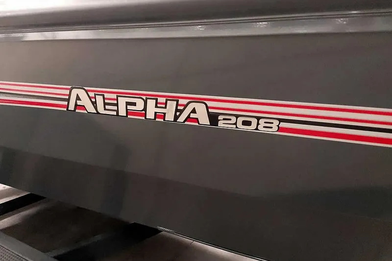 Slide: The Image of 2025 Ranger ALPHA 208 boat with red and white stripes on the side. - 1
