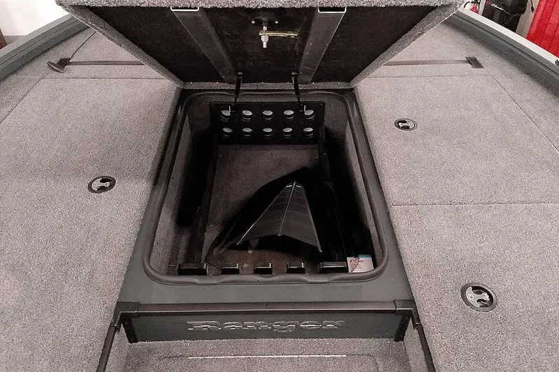 Slide: The Image of Open storage compartment in 2025 Ranger ALPHA 208 boat, showcasing interior design. - 15