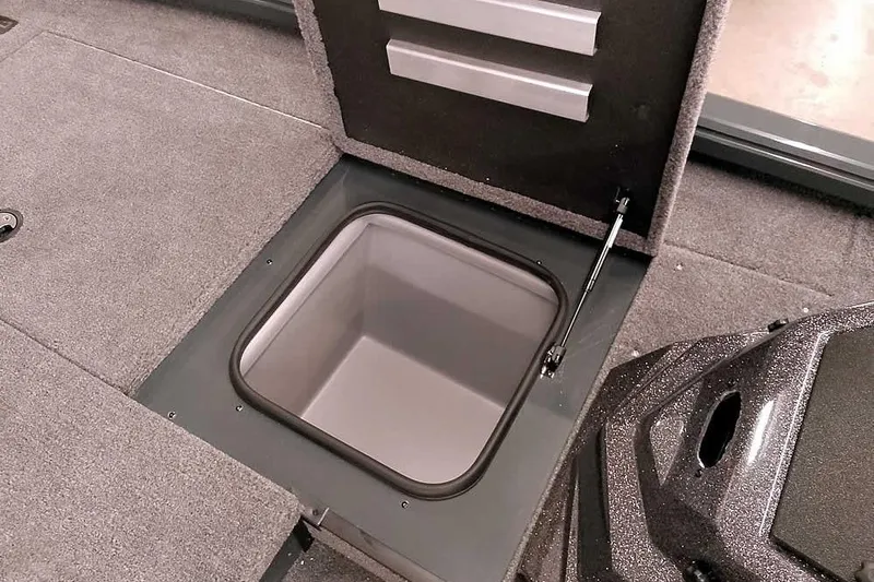Slide: The Image of Open storage compartment in 2025 Ranger ALPHA 208 boat interior. - 16