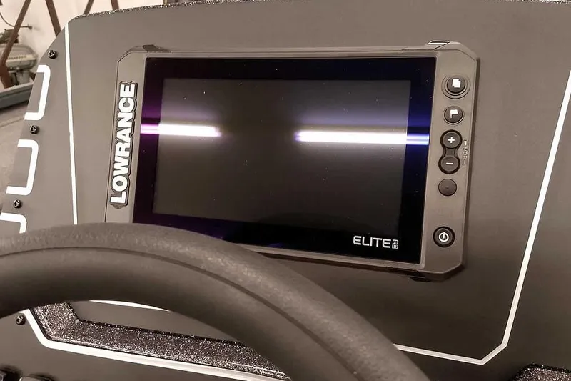 Slide: The Image of Dashboard of 2025 Ranger ALPHA 208 with Lowrance Elite display. - 28