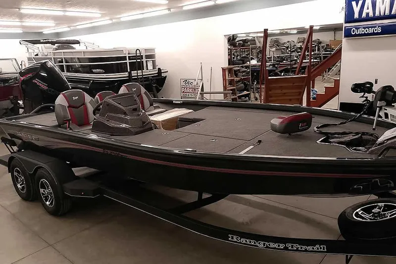 Slide: The Image of 2025 Ranger ALPHA 208 boat in showroom, featuring sleek design and modern equipment. - 38