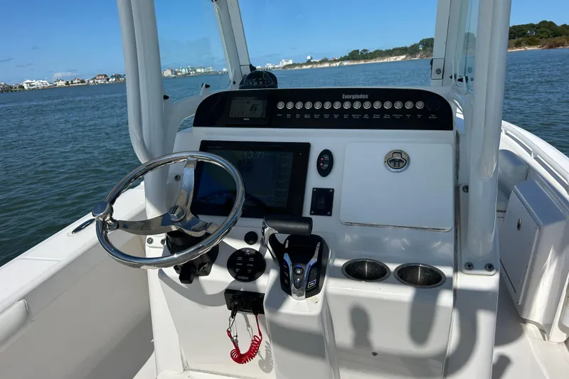 Slide: The Image of Yamaha display showing fuel usage and trip hours on Everglades 243 Center Console, 2016 model. - 10