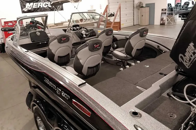 Slide: The Image of 2020 Ranger 1880MS Angler boat interior with seating and dashboard view. - 12