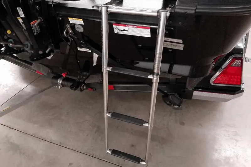 Slide: The Image of 2020 Ranger 1880MS Angler boat with a metal boarding ladder attached. - 14