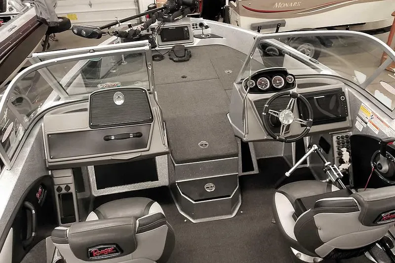 Slide: The Image of 2020 Ranger 1880MS Angler boat interior with steering wheel and seating. - 16
