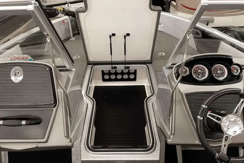 Slide: The Image of 2020 Ranger 1880MS Angler boat interior with steering wheel and dashboard controls. - 18