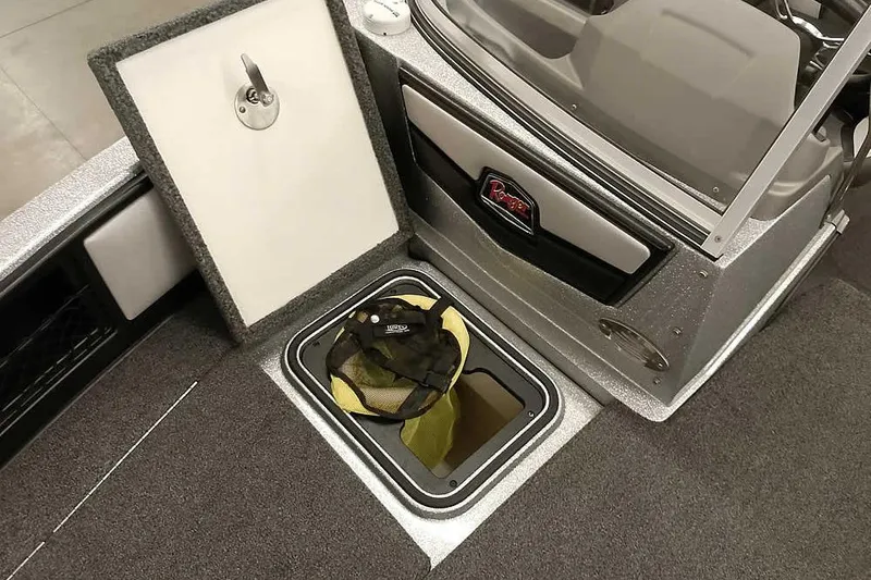 Slide: The Image of 2020 Ranger 1880MS Angler boat interior with open storage compartment and safety gear. - 19