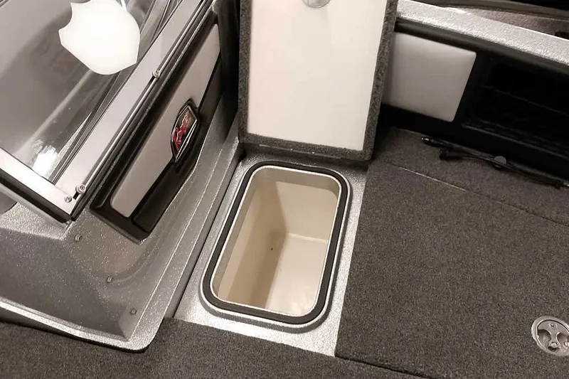 Slide: The Image of 2020 Ranger 1880MS Angler boat interior storage compartment with open lid. - 22