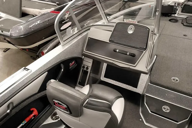 Slide: The Image of 2020 Ranger 1880MS Angler boat interior with seating and dashboard. - 29