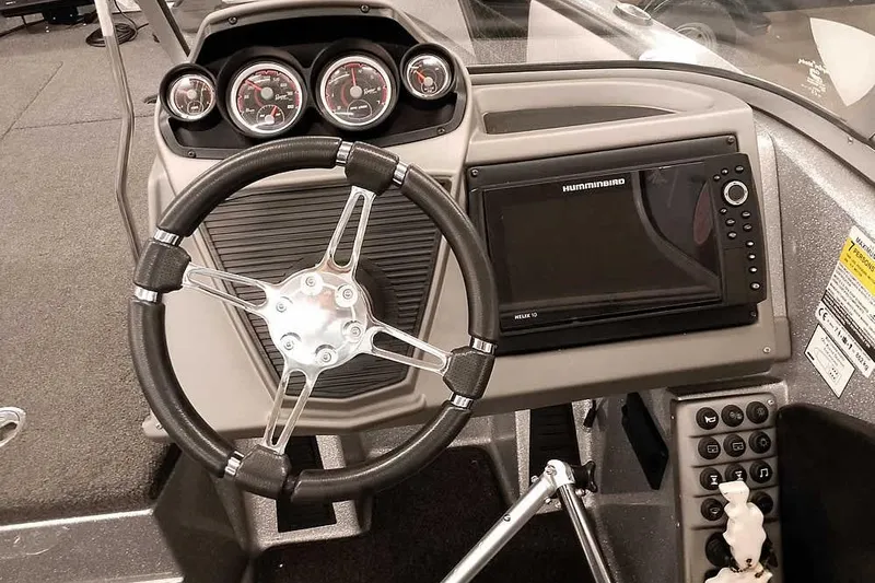 Slide: The Image of 2020 Ranger 1880MS Angler dashboard with steering wheel and Humminbird Helix 10 display. - 34