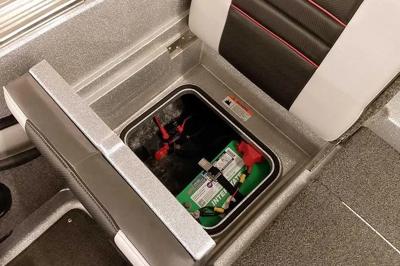 Slide: The Image of 2020 Ranger 1880MS Angler boat battery compartment with secure storage. - 42